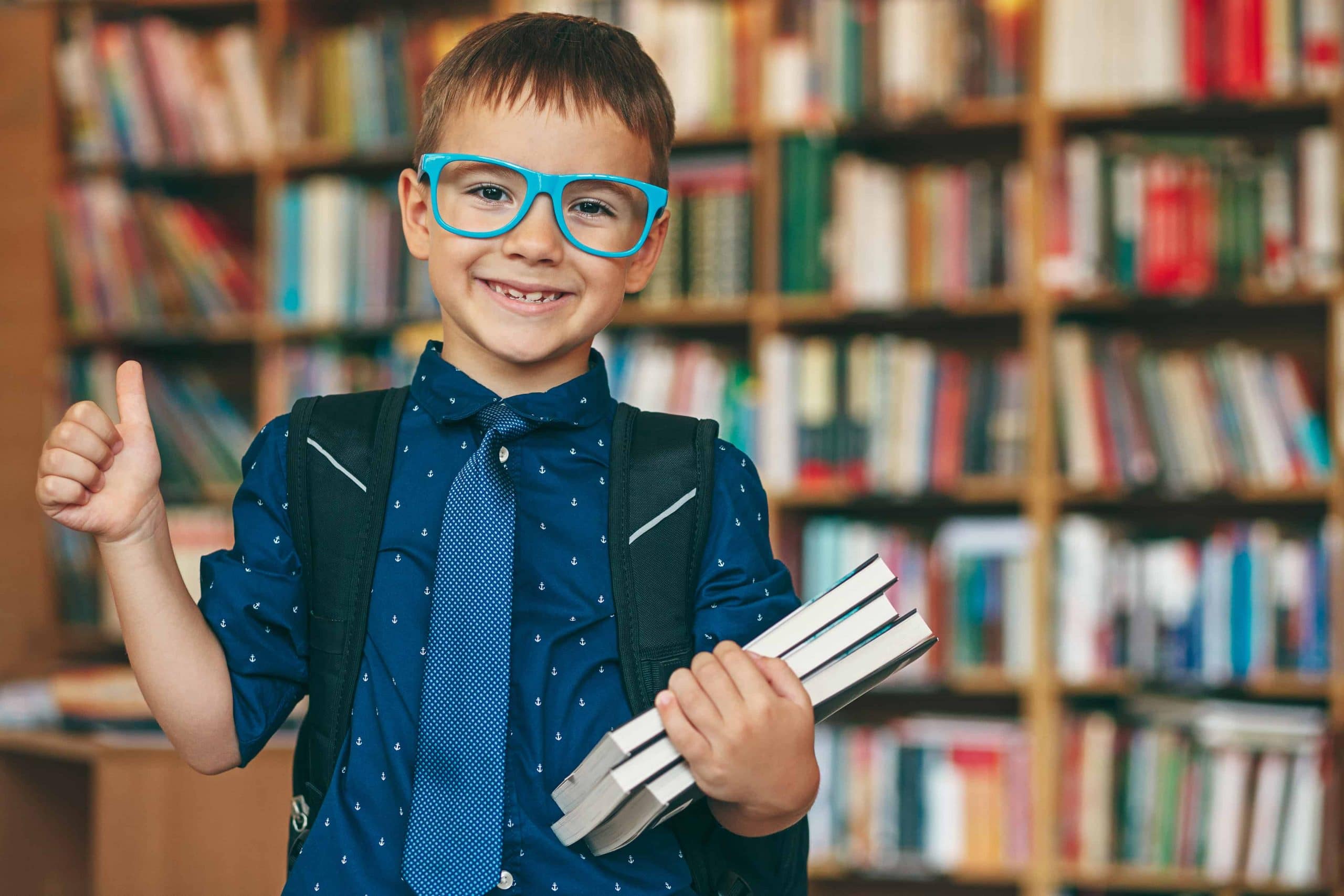 happy-boy-in-library-NEJ92EY-1